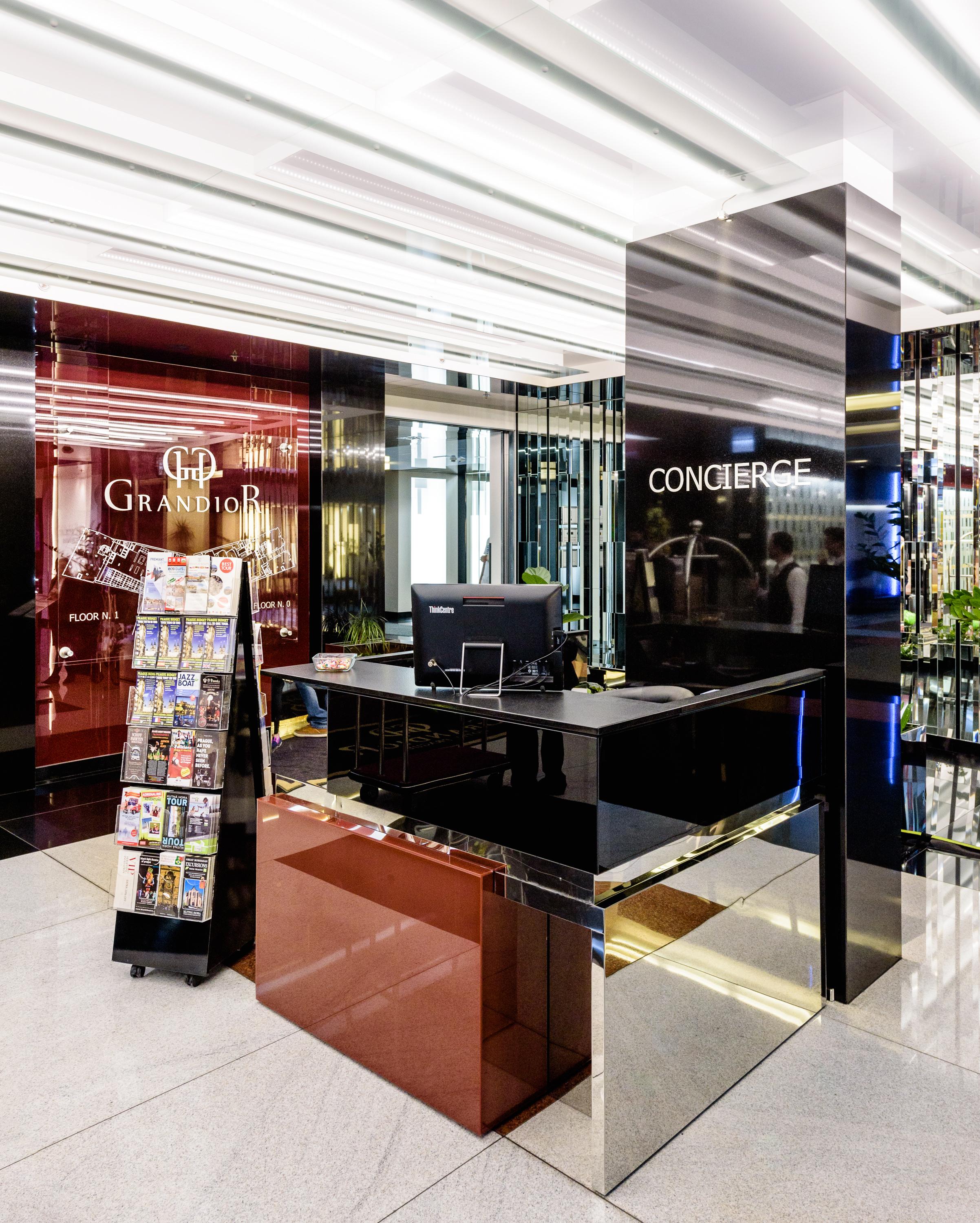 Grandior Hotel Praga Esterno foto Concierge desk at the Grand Dior